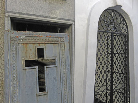 A door ajar on a crypt at the Cementerio de la Recoleta in Buenos Aires, Argentina.