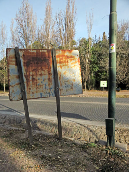 Pole Position with a rusty sign in Parque General San Martin, Mendoza, Argentina.