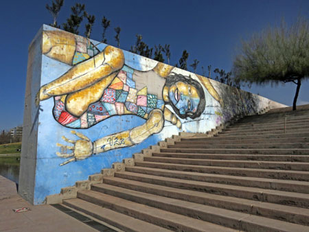 A mural next to some stairs at the Annexo MMAMM in Mendoza, Argentina.