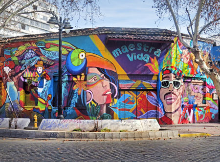 A colorful mural on Avenida Pio Nono in Bella Vista, Santiago, Chile.