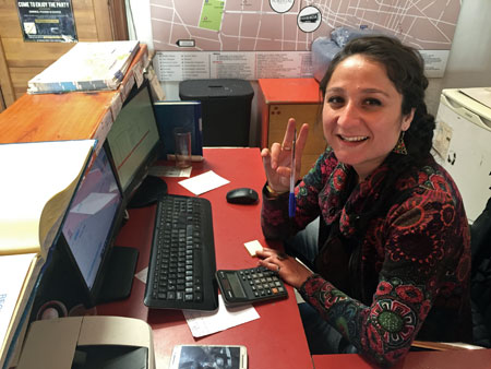 The friendly receptionist Aiylin at the Hostel Plaza de Armas in Santiago, Chile.