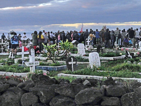 A funeral at the cemetery in Hanga Roa, Rapa Nui, Chile.