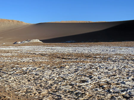An immense black sand dune in the Valle de la Luna near San Pedro de Atacama, Chile.