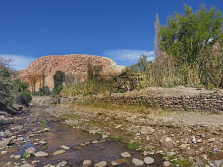 A creek and rock formation in the Jerez Valley, Chile.