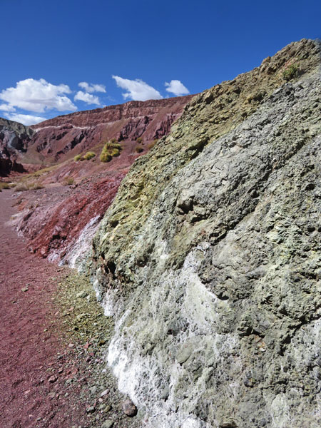 Rough hewn red and green slabs in the Valle de Arcoiris, near San Pedro de Atacama, Chile.