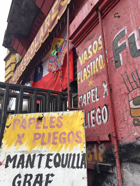 Hand-painted signs in Santiago, Chile.