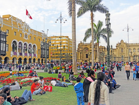 Hordes of people enjoy the Plaza de Armas in Lima, Peru.
