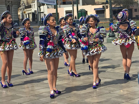 Caporales dancers on Avenida Paseo de la Republica in Lima, Peru.