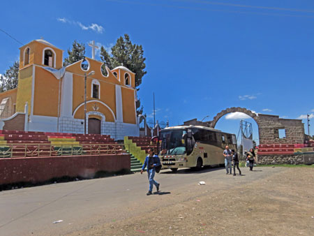 A Catholic church and an arch in Kasani at the border between Bolivia and Peru.