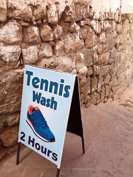 Get your tennis washed in two hours in Cuzco, Peru.
