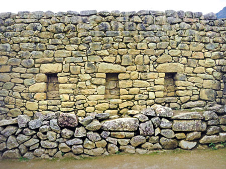 A stone wall built by the Incas at Machu Picchu, Peru.